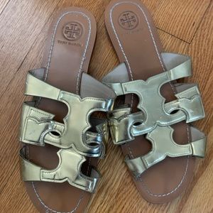 Gold Tory Burch interlocking T gold sandals. Size7
